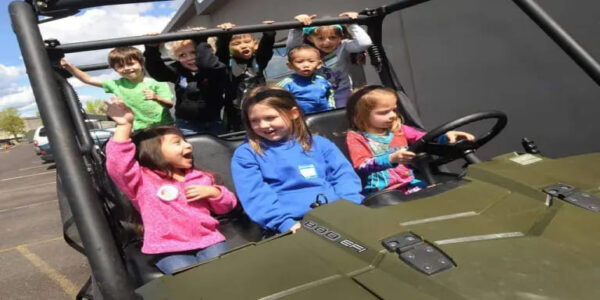 a-group-of-kids-attending-kids-day-at-pang-play-inside a car